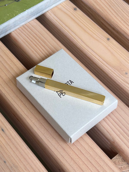 Queue slim stick lighter in gold by Tsubota Pearl