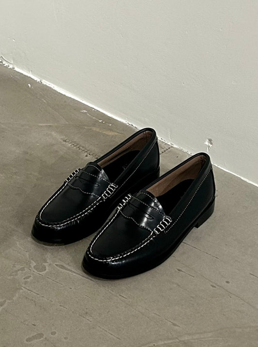 G.H. Bass penny loafers in black with contrast stitching