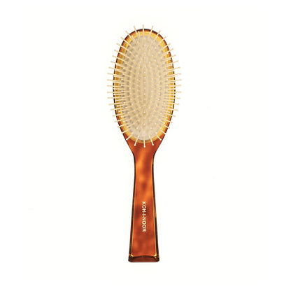 Hair brush with plastic bristles