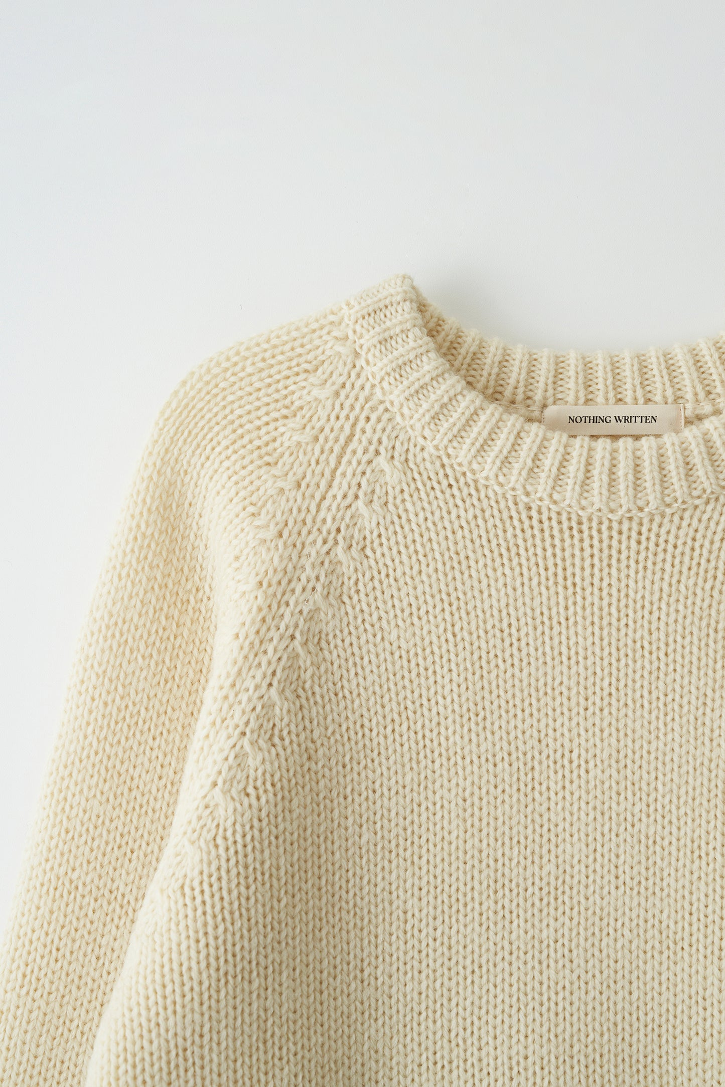 U-neck knitted sweater in ivory