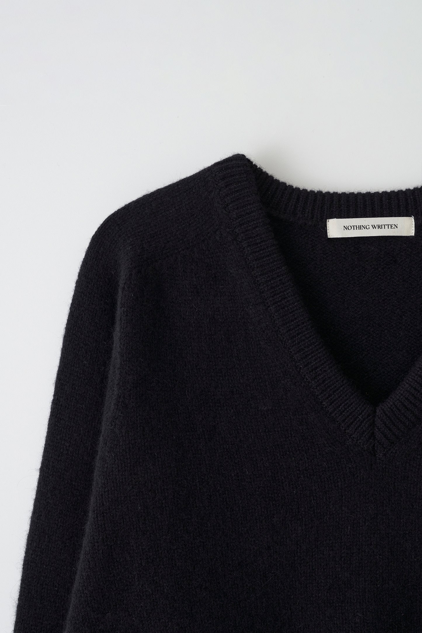V-neck alpaca sweater in black