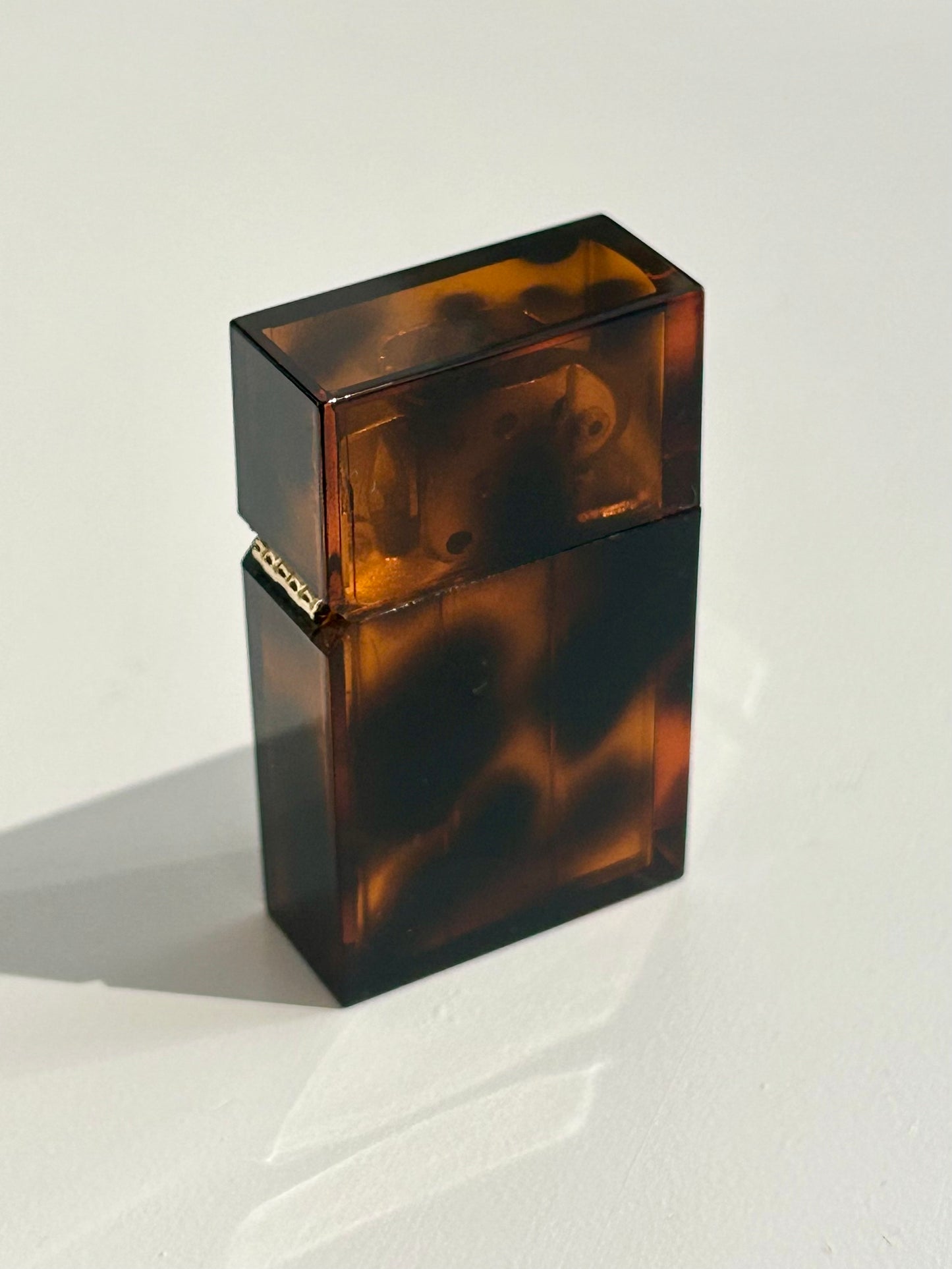 Hard edge lighter in brown tortoise